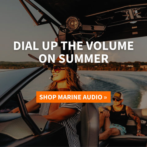 couple having fun on boat with good marine speakers